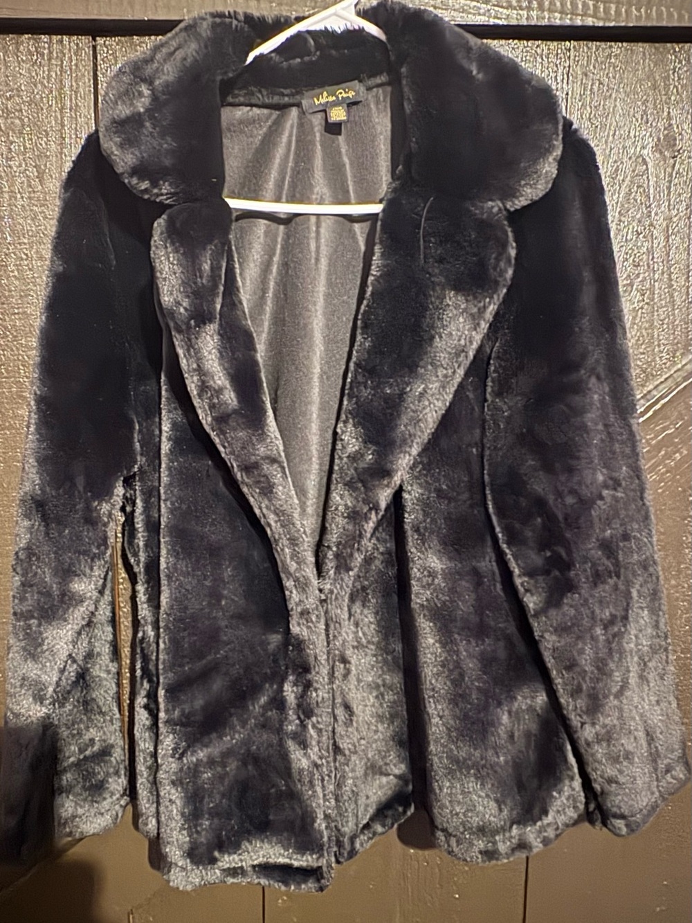 Black Fur (faux) waist length jacket.